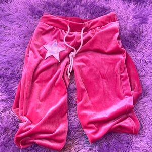 Pink velvet sweat pants with a star. Size small
